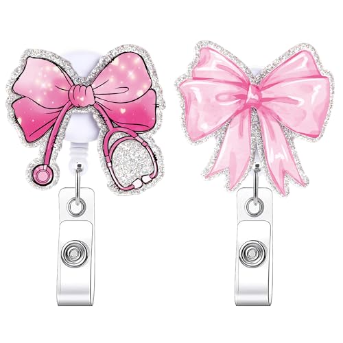 AFRITEE Coquettte Schleifen-Abzeichenspule, niedliche rosa Schleife, einziehbare Krankenschwester-Ausweishalter, Acryl-Ausweishalter mit Krokodilklemme, medizinischer Assistent, Arbeitszubehör AFRITEE Coquettte Schleifen-Abzeichenspule, niedliche rosa Schleife, einziehbare Krankenschwester-Ausweishalter, Acryl-Ausweishalter mit Krokodilklemme, medizinischer Assistent, Arbeitszubehör von AFRITEE