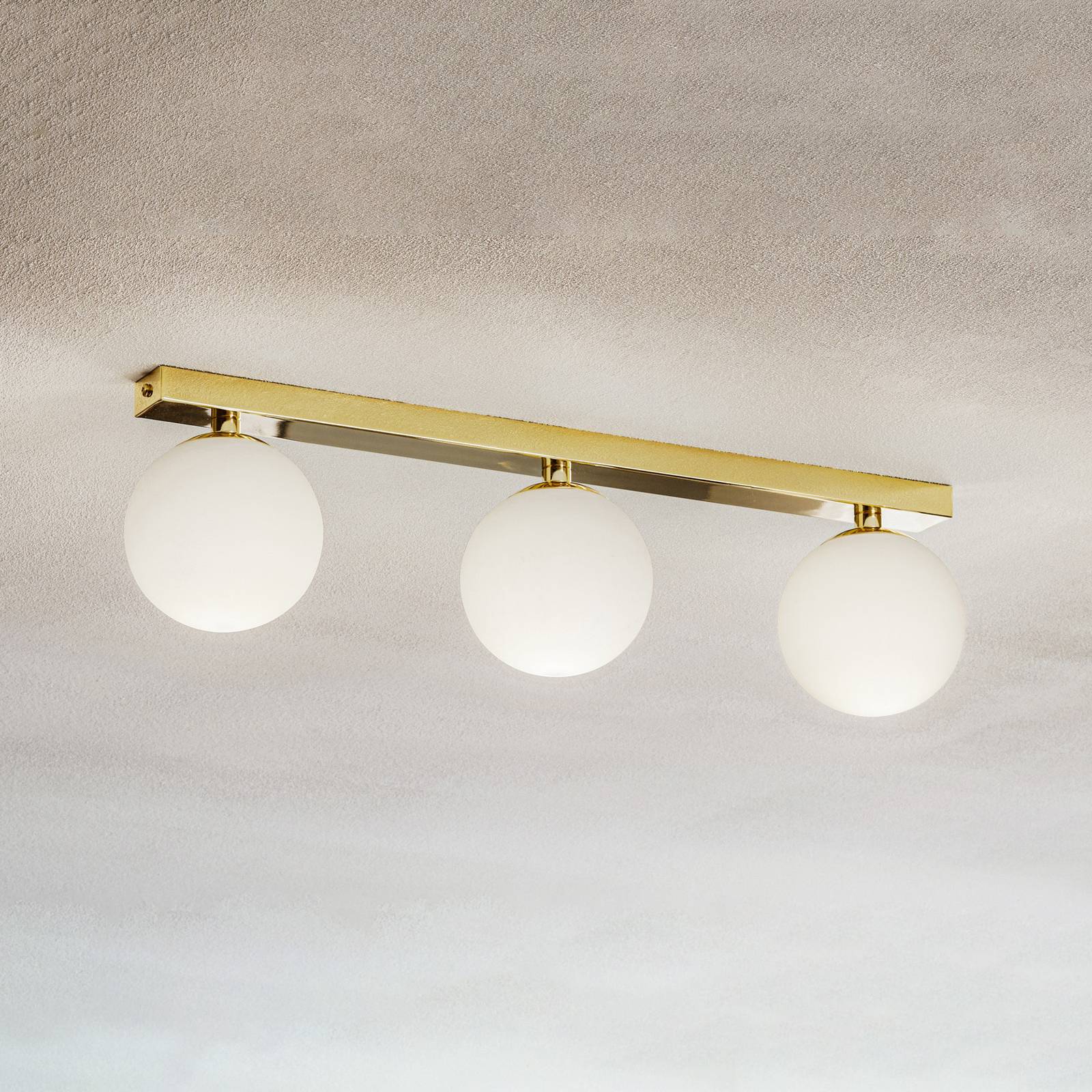 Deckenlampe Fatis Opalglas/messing 3-flammig lang Deckenlampe Fatis Opalglas/messing 3-flammig lang von Argon