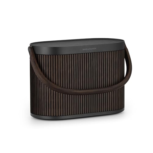 Bang & Olufsen Beosound A5 - Loud Wireless Home and Portable Bluetooth 360° Speaker with USB-C Cable and Integrated Qi Wireless Charging Pad - Dark Oak Bang & Olufsen Beosound A5 - Loud Wireless Home and Portable Bluetooth 360° Speaker with USB-C Cable and Integrated Qi Wireless Charging Pad - Dark Oak von Bang & Olufsen