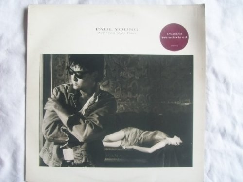 PAUL YOUNG Between Two Fires UK LP 1986 von CBS