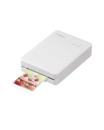Canon SELPHY QX20 mobiler Fotodrucker – per WLAN direkt vom Smartphone drucken. Thermosublimationsdruck, 2 Größen Stickerpapier und Laden per USB-C - Weiß (ohne Farband/Papier) Canon SELPHY QX20 mobiler Fotodrucker – per WLAN direkt vom Smartphone drucken. Thermosublimationsdruck, 2 Größen Stickerpapier und Laden per USB-C - Weiß (ohne Farband/Papier) von Canon