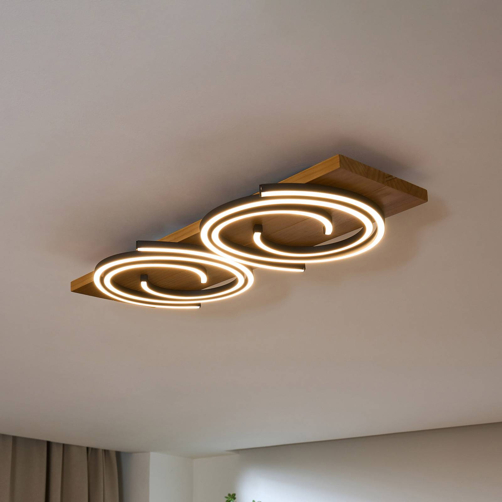 LED-Deckenleuchte Rifia, braun, Länge 70 cm, 2-flg. Holz LED-Deckenleuchte Rifia, braun, Länge 70 cm, 2-flg. Holz von Eco-Light