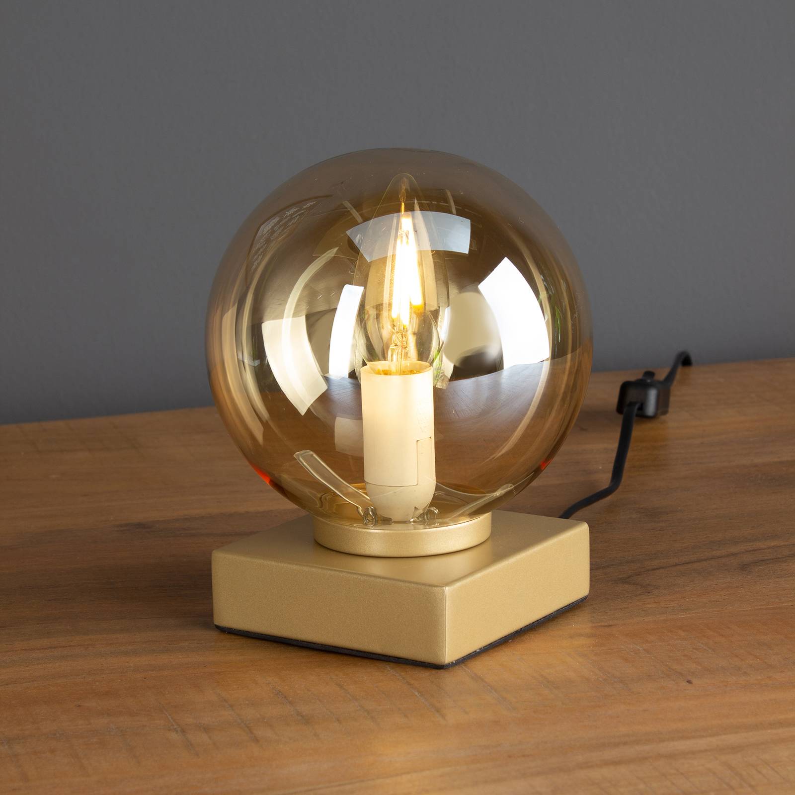 Tischleuchte Pluto gold mit Glaskugel creme Tischleuchte Pluto gold mit Glaskugel creme von Eco-Light