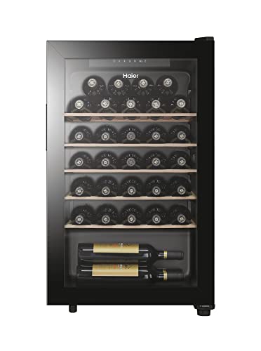 Haier HWS33GG Weinkühlschrank / 33 Flaschen / 83 cm Höhe / 1 Zone/UV undurchlässige Glastür / 5 Holzablagen/LED Beleuchtsystem/Vibrationsarmer Kompressor/hOn App, Schwarz von Haier