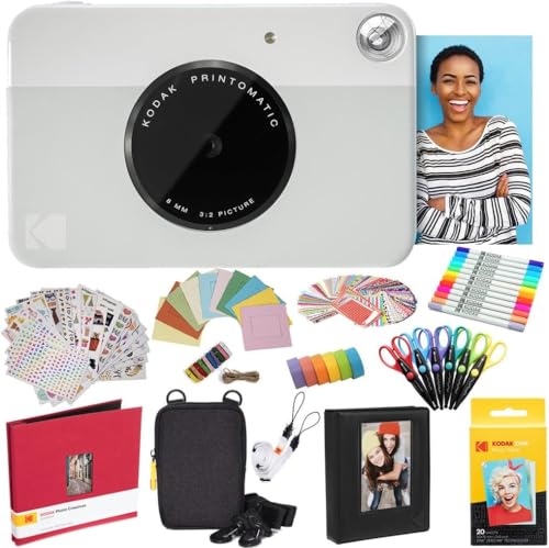 KODAK Printomatic Instant Camera (Grau) Komplettpaket + Zinkpapier (20 Blatt) + Luxusetui + Fotoalbum + 7 Aufklebersätze + Marker + Scheren + Randaufkleber und mehr von KODAK