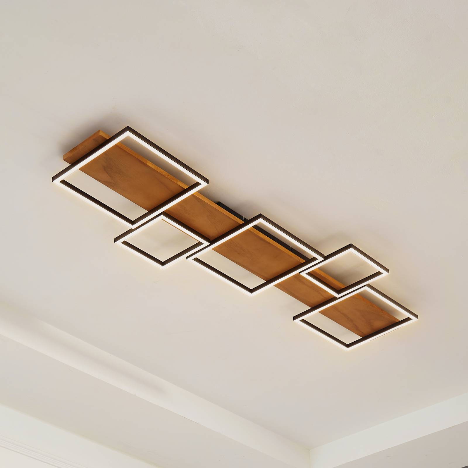 Lindby LED-Deckenlampe Galad, schwarz, Holz, 5-flg., 140 cm Lindby LED-Deckenlampe Galad, schwarz, Holz, 5-flg., 140 cm von LINDBY