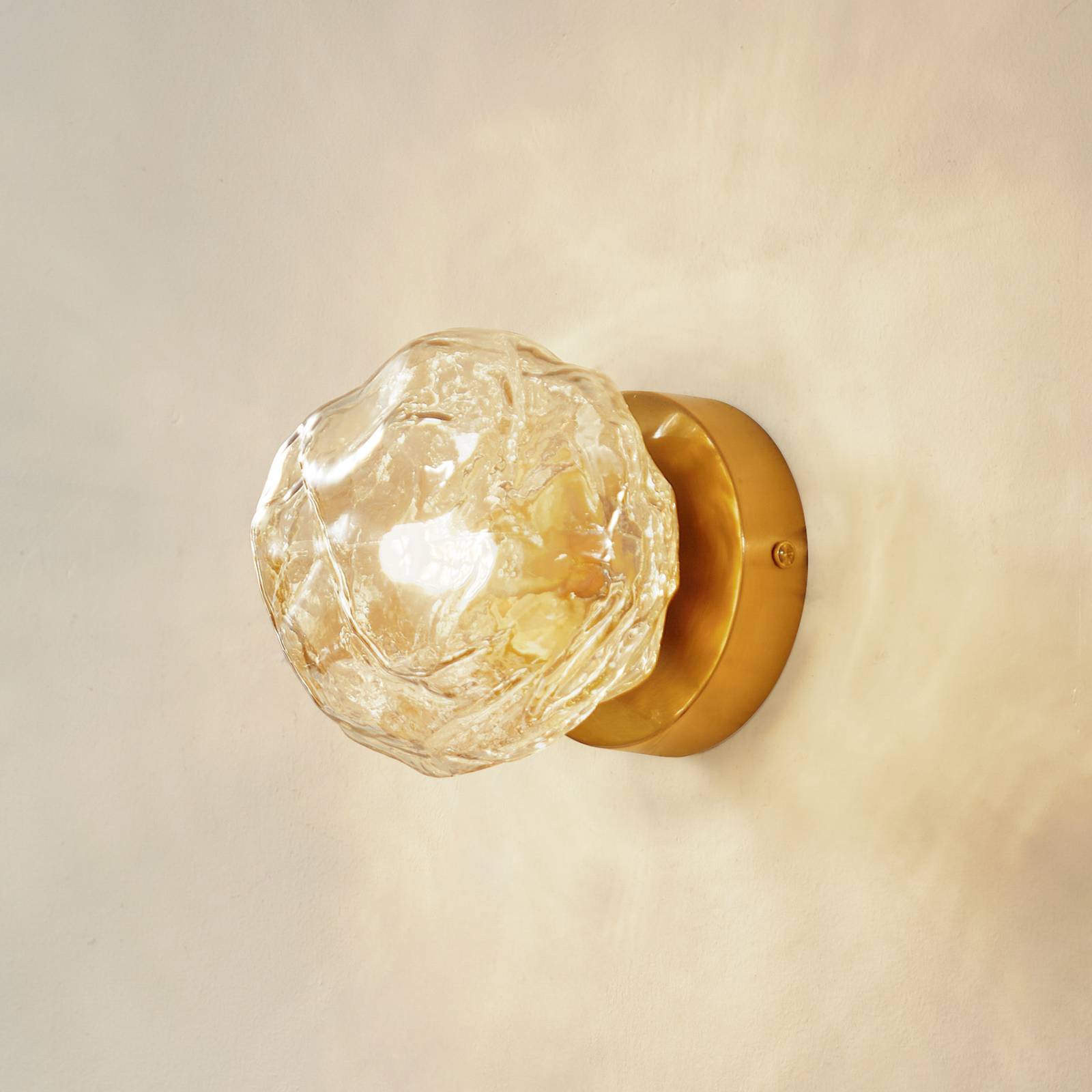 Lindby Wandleuchte Piatra, amber/messing, Glas, Ø 16 cm, G9 Lindby Wandleuchte Piatra, amber/messing, Glas, Ø 16 cm, G9 von LINDBY