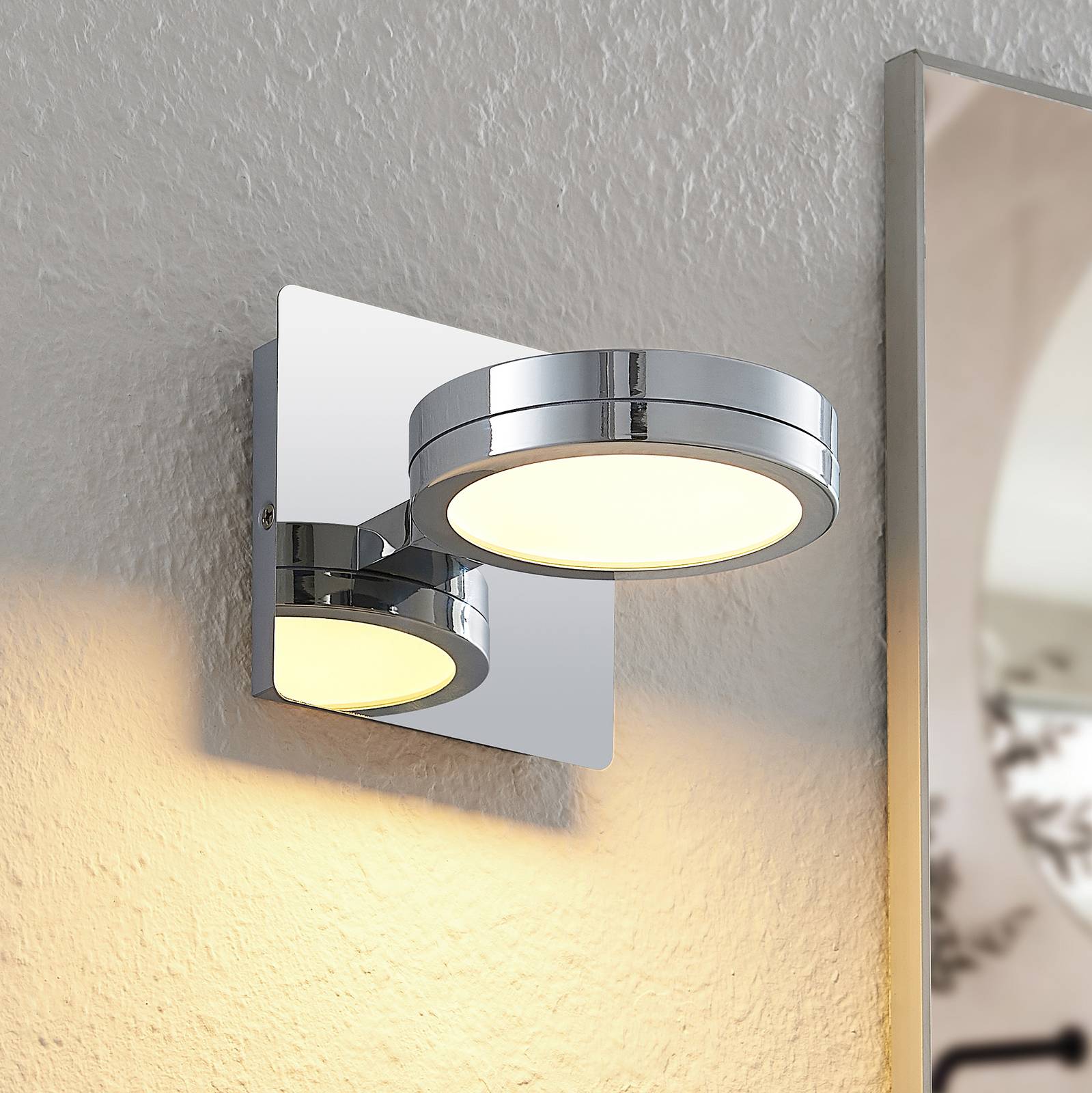 Lindby Wandleuchte Skrolla, 1-flammig, 11 cm hoch, CCT, IP44 Lindby Wandleuchte Skrolla, 1-flammig, 11 cm hoch, CCT, IP44 von LINDBY