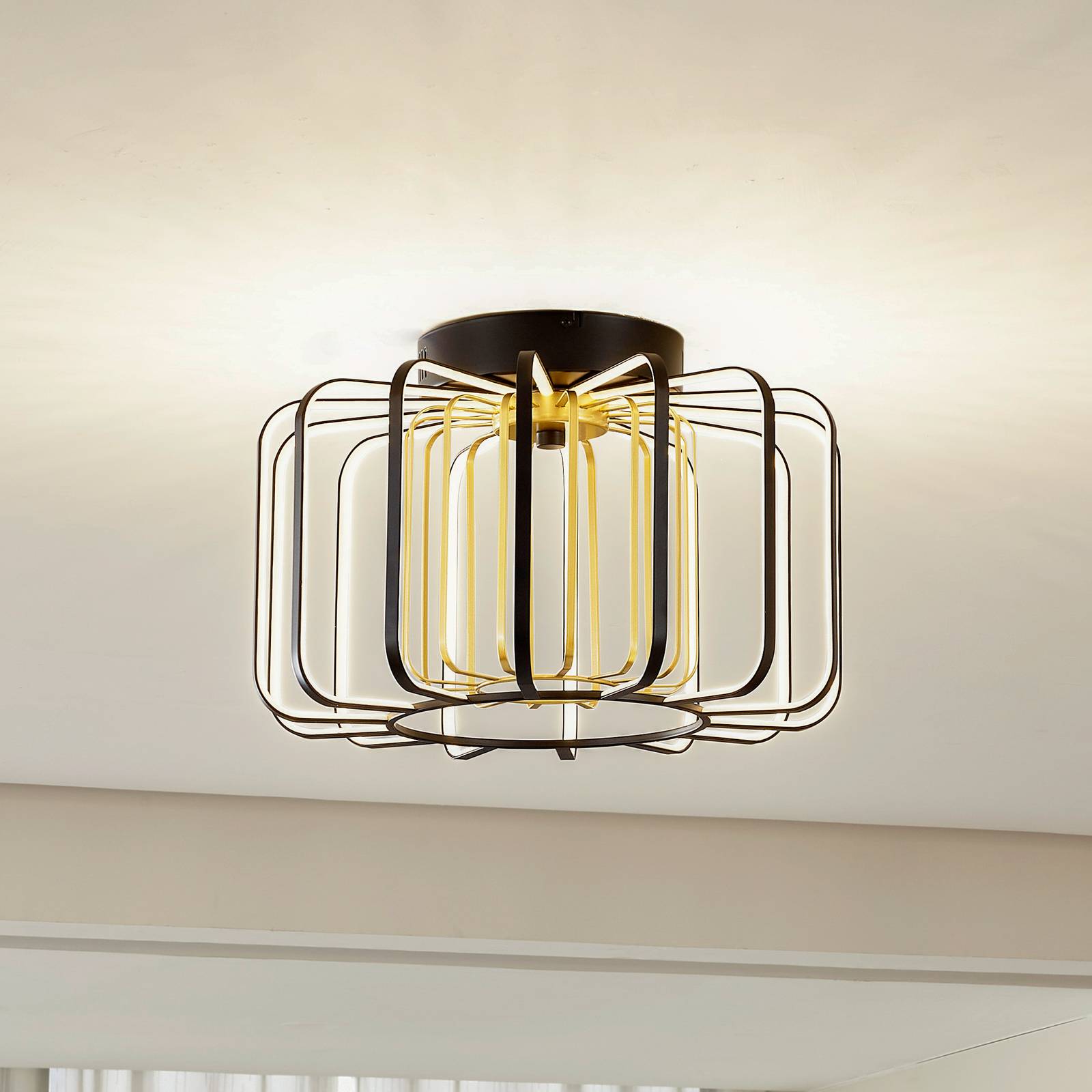 Lucande LED-Deckenleuchte Birger, Ø 39,5cm, schwarz/gold Lucande LED-Deckenleuchte Birger, Ø 39,5cm, schwarz/gold von LUCANDE