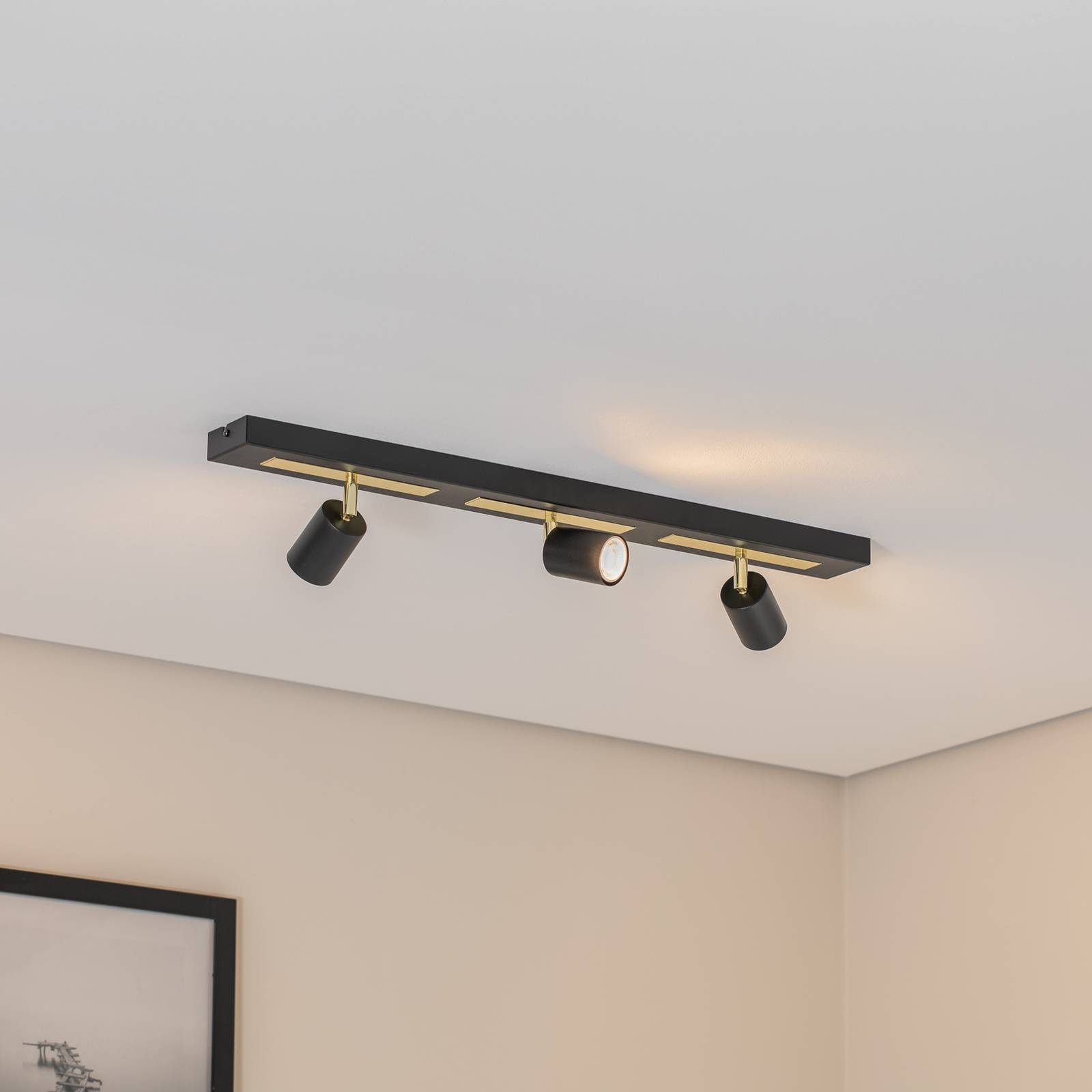 Deckenstrahler Rodez, schwarz/gold, Länge 80 cm, 3-flg. Deckenstrahler Rodez, schwarz/gold, Länge 80 cm, 3-flg. von Luminex