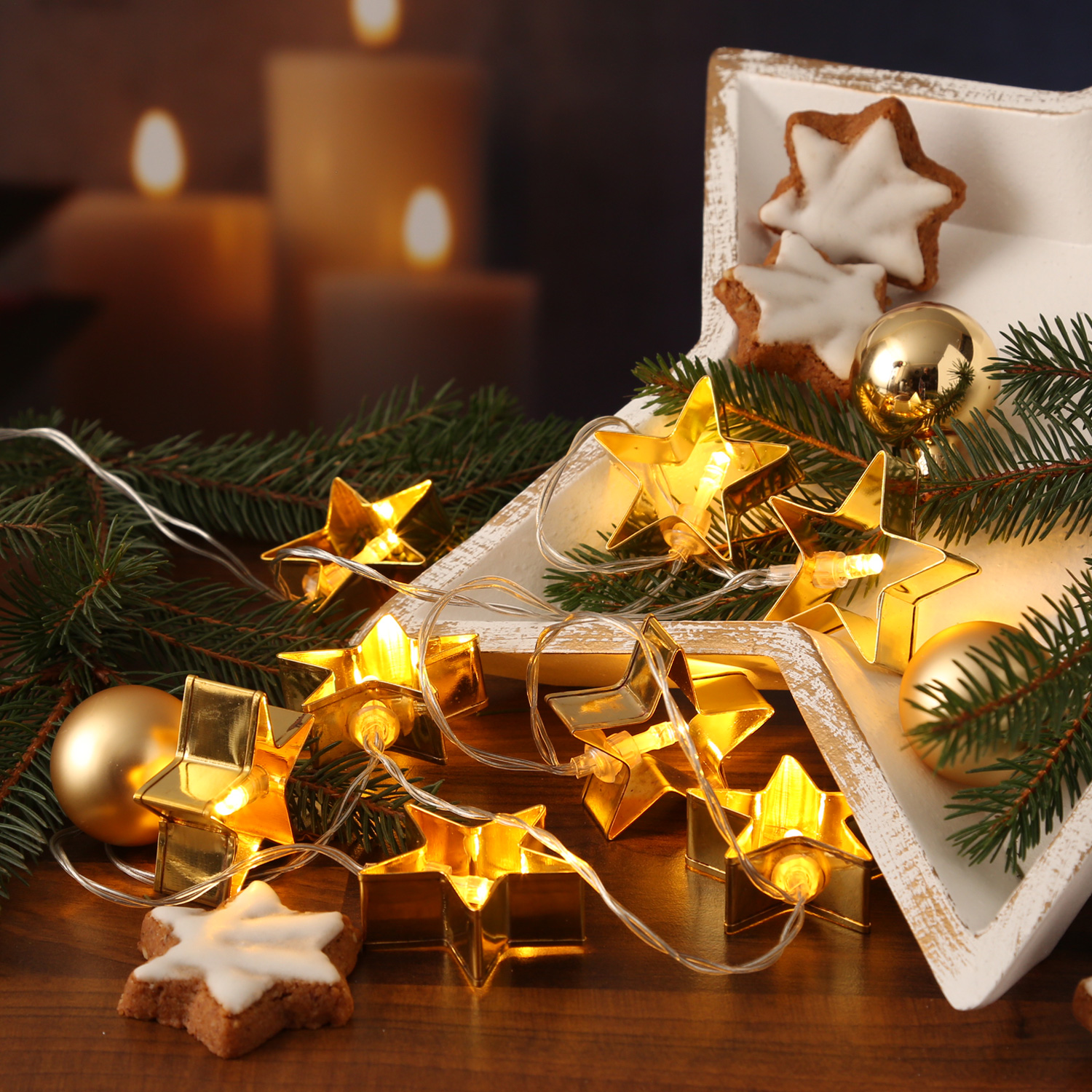 LED Lichterkette Backförmchen goldene Sterne - 8 warmweiße LED - Batteriebetrieb - L: 1,4m - silber LED Lichterkette Backförmchen goldene Sterne - 8 warmweiße LED - Batteriebetrieb - L: 1,4m - silber von MARELIDA