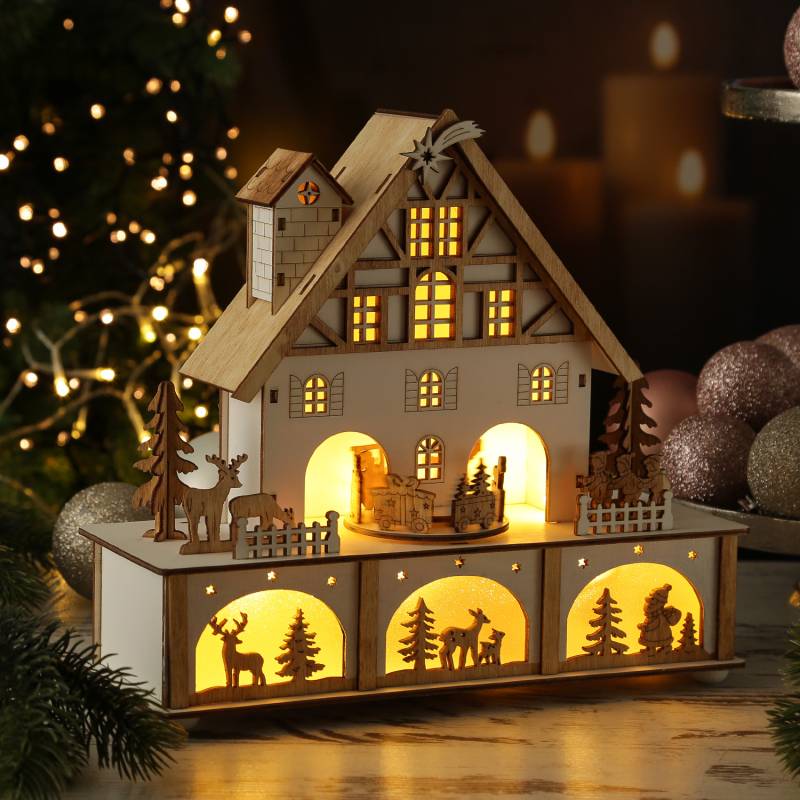 LED Weihnachtshaus mit Musik und drehendem Karussell - beleuchtete Weihnachtsszene - H: 25cm von MARELIDA