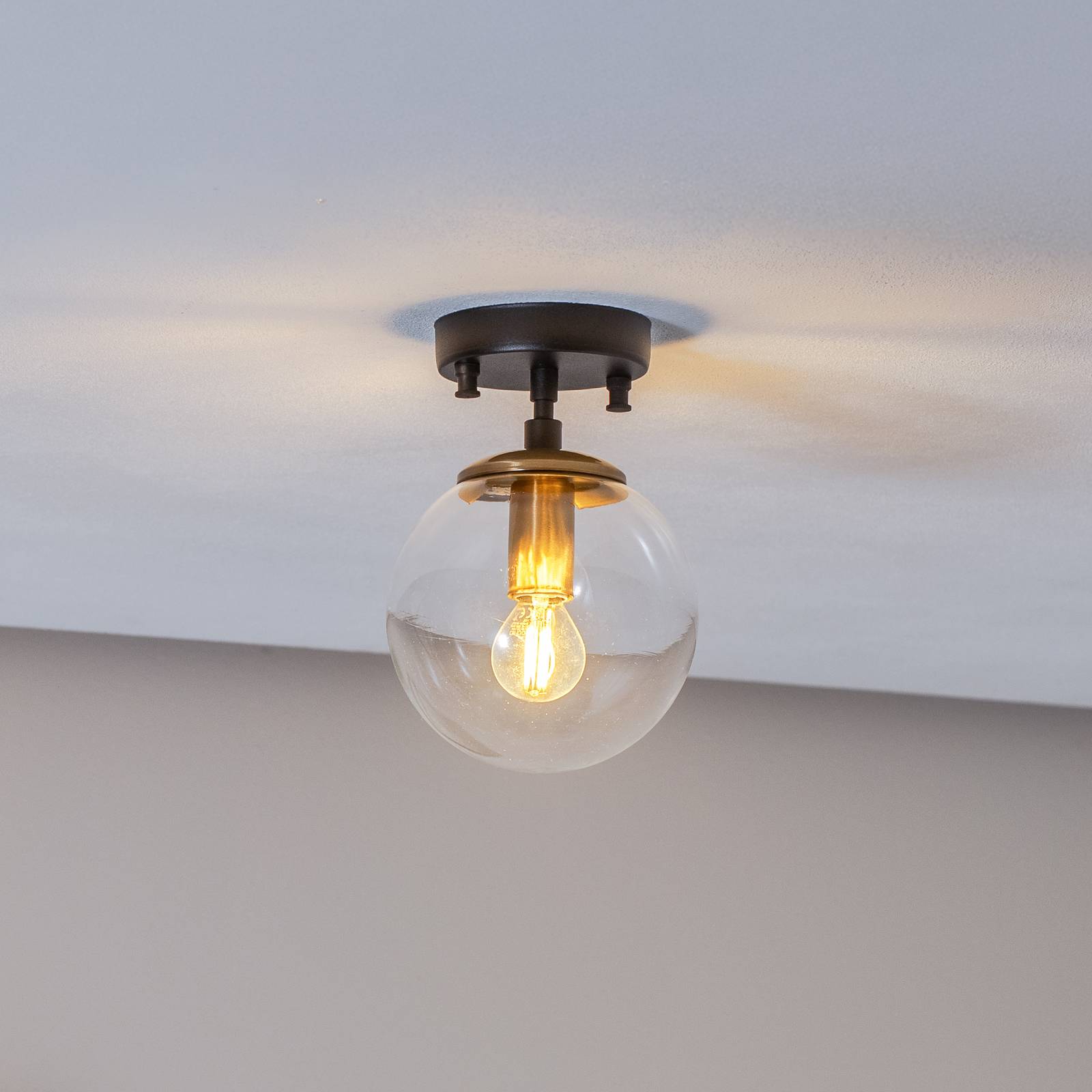 Deckenlampe Atmaca 10205 gold antik/schwarz Glas klar Ø 15cm Deckenlampe Atmaca 10205 gold antik/schwarz Glas klar Ø 15cm von Opviq