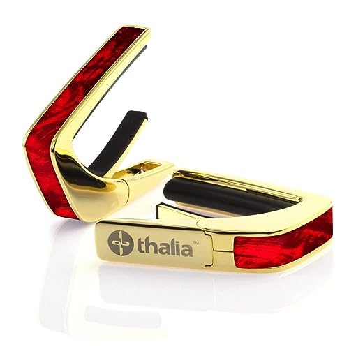 Thalia Exotic Shell Series Kapodaster mit Gold-Finish und Red Angel Wing Einlage Thalia Exotic Shell Series Kapodaster mit Gold-Finish und Red Angel Wing Einlage von Thalia