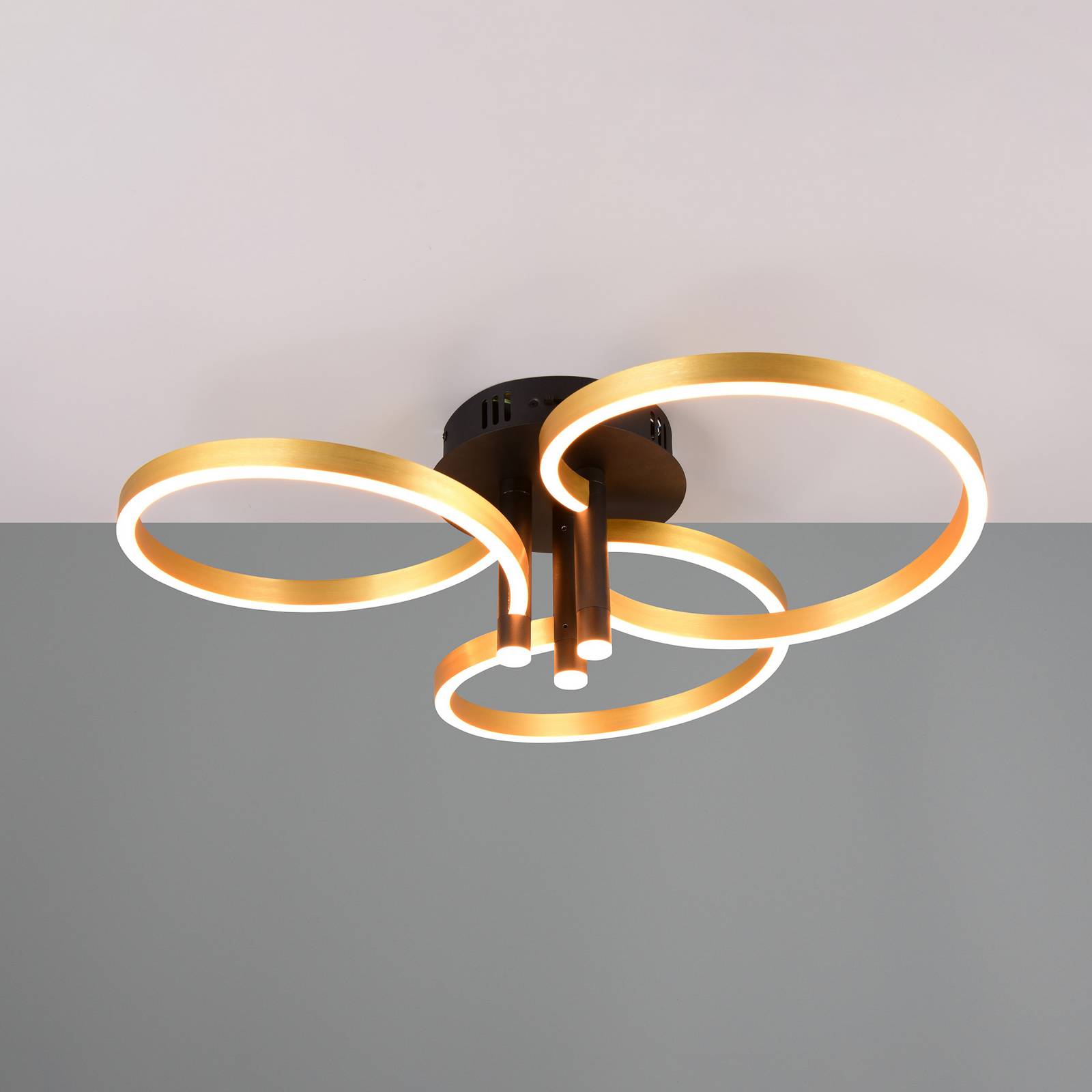 LED-Deckenlampe Caruso, gold/schwarz, Ø 66 cm Metall CCT dim LED-Deckenlampe Caruso, gold/schwarz, Ø 66 cm Metall CCT dim von Trio Lighting