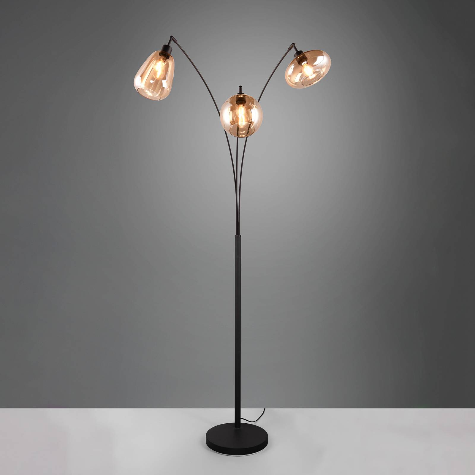 Stehleuchte Lumina, 3-flammig, schwarz/amber, Glas Stehleuchte Lumina, 3-flammig, schwarz/amber, Glas von Trio Lighting