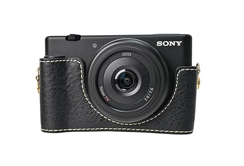 VOVMOEYA Kamera-Halbtasche für Sony ZV-1M2/ZV-1F, PU-Leder, Kamerakäfig, Kit mit Kameragurt, Schwarz VOVMOEYA Kamera-Halbtasche für Sony ZV-1M2/ZV-1F, PU-Leder, Kamerakäfig, Kit mit Kameragurt, Schwarz von VOVMOEYA