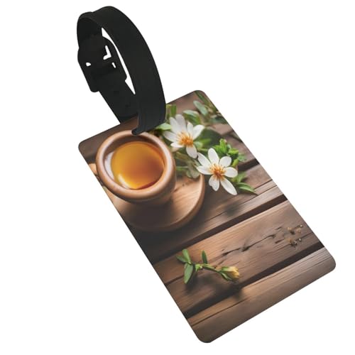 Wiederverwendbare Gepäckanhänger mit blaugrünen Blumen auf Holzplanke, stilvolles Reise-Urlaubszubehör Wiederverwendbare Gepäckanhänger mit blaugrünen Blumen auf Holzplanke, stilvolles Reise-Urlaubszubehör von njkhbolk